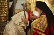 Pope Francis and Ecumenical Patriarch Bartholomew of Constantinople embrace during a prayer service in the patriarchal Church of St. George in Istanbul Nov. 29. (CNS photo/Paul Haring