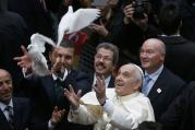  Pope Francis releases doves prior to celebrating Mass at the Cathedral of the Holy Spirit in Istanbul Nov. 29. (CNS photo/Stoyan Nenov, Reuters)