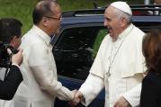 Pope Francis greets Philippine President Benigno Aquino III during a welcoming ceremony at the presidential palace in Manila Jan. 16. (CNS photo/Paul Haring) 