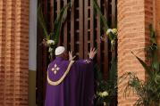 Pope Francis opens the Holy Door as he begins the Holy Year of Mercy at the start of a Mass with priests, religious, catechists and youths at the cathedral in Bangui, Central African Republic, Nov. 29. (CNS photo/Paul Haring) 