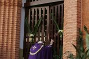 Pope Francis opens the Holy Door as he begins the Holy Year of Mercy at the start of a Mass with priests, religious, catechists and youths at the cathedral in Bangui, Central African Republic, Nov. 29. (CNS photo/Paul Haring)