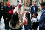 Pope Francis blesses a woman as he meets the disabled during the opening of the Diocese of Rome's annual pastoral conference at the Basilica of St. John Lateran in Rome June 16. (CNS photo/Tony Gentile, Reuters) 