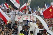 Pope Francis greets the crowd as he arrives to attend the World Youth Day welcoming ceremony in Blonia Park in Krakow, Poland, July 28. (CNS photo/Paul Haring)