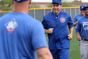 Father Burke Masters, Chicago Cubs' chaplain, takes part in a practice with players during spring training in March 2016 at Sloan Park in Mesa, Ariz. Cubs Manager Joe Maddon invited Father Masters to practice with the team. (CNS photo/Ed Mailliard, courtesy Topps) 