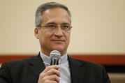 Msgr. Dario Vigano, then-prefect of the Vatican Secretariat for Communication, is pictured at a news conference at the Vatican in this Feb. 8 file photo. (CNS photo/Paul Haring)