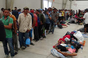 Central American migrants gather before continuing their journey on March 31 in Ixtepec, Oaxaca, Mexico. (CNS photo/Jose Jesus Cortes, Reuters) 