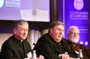 Chicago Cardinal Blase J. Cupich, left, speaks during a Feb. 1, 2019, panel discussion at the Leadership Roundtable's Catholic Partnership Summit in Washington to put forth possible solutions to the church's sex abuse crisis.  (CNS photo/Ralph Alswang, courtesy Leadership Roundtable) 