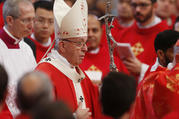  Pope Francis arrives in procession to celebrate Mass marking the feast of Pentecost in St. Peter's Basilica at the Vatican May 20. The pope at his "Regina Coeli" announced that he will create 14 new cardinals June 29. (CNS photo/Paul Haring)