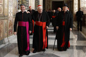 Cardinal Bernard F. Law and Cardinal Agostino Cacciavillan, former apostolic nuncio to the United States, leave after Pope Francis' audience with members of the Roman Curia in Clementine Hall at the Vatican Dec. 22, 2014 (CNS photo/Paul Haring). 