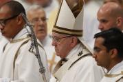 Pope Francis arrives to celebrate the Holy Thursday chrism Mass in St. Peter's Basilica at the Vatican, March 24 (CNS photo/Paul Haring). 