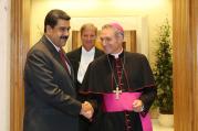 Venezuelan President Nicolas Maduro is greeted by Archbishop Georg Ganswein, prefect of the papal household, prior to an Oct. 24 private meeting between Maduro and Pope Francis at the Vatican (CNS photo/Miraflores Palace handout via EPA).