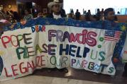 Pope Francis, Please Help. Migration and human rights activists greet reporters arriving in Juarez this afternoon. Photo: Kevin Clarke