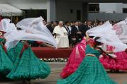 Dancers perform as Pope Francis arrives at Silvio Pettirossi International Airport in Asuncion, Paraguay, July 10 (CNS photo/Paul Haring).